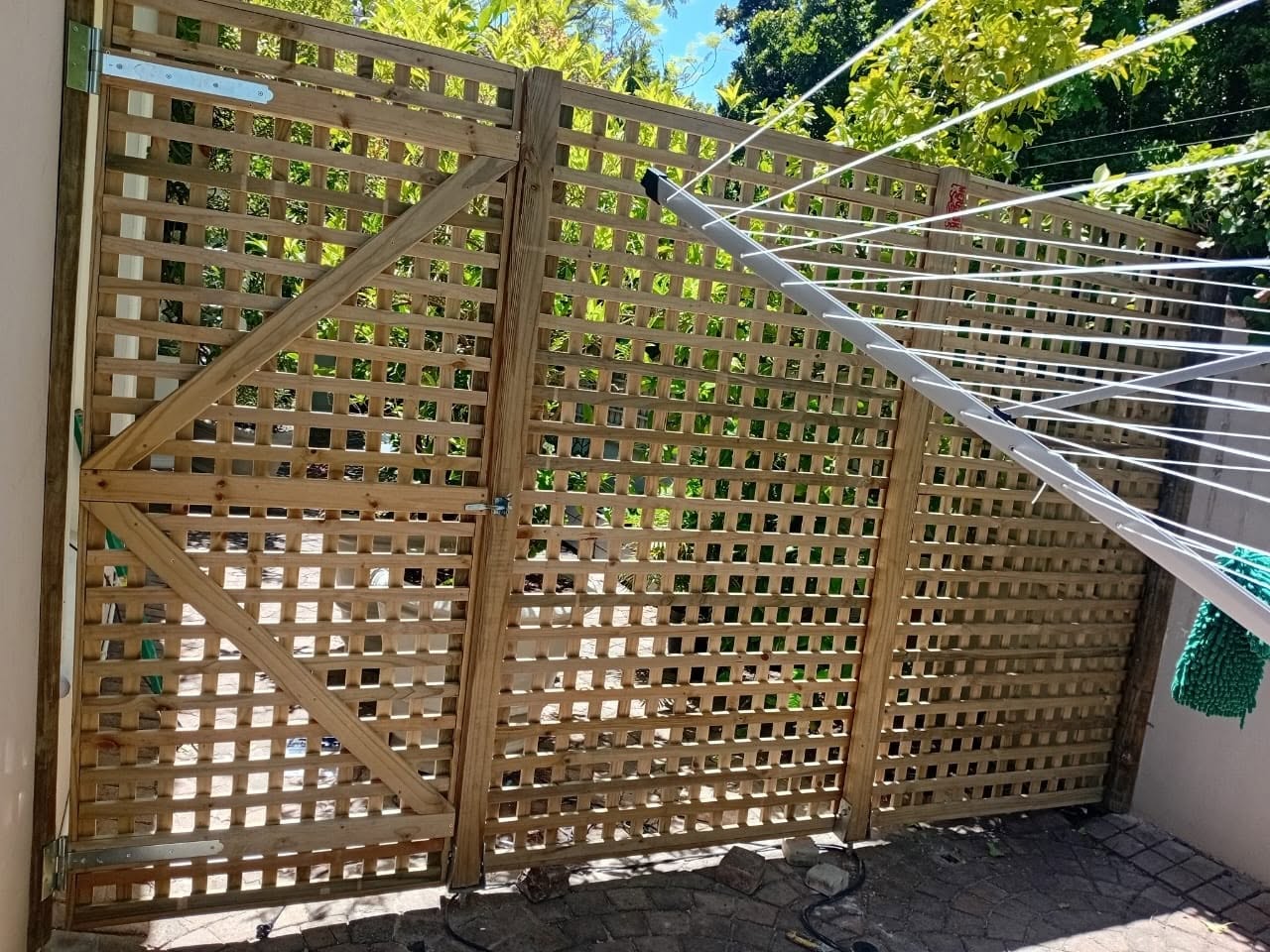 Installation of pole yard, fence and gate in Constantia